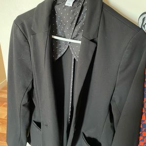 woman’s black blazer